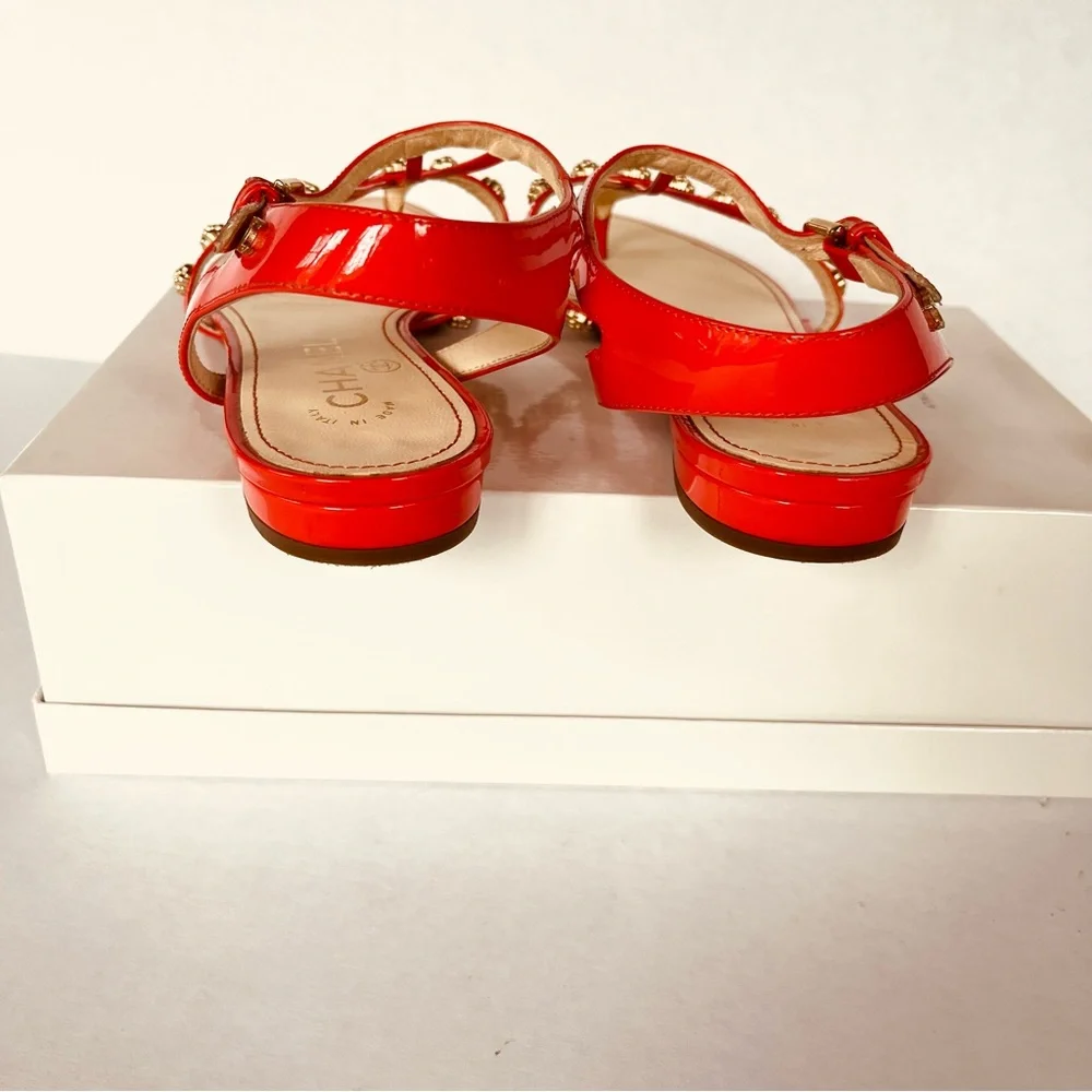 CHANEL coral red gold camellia studded flat sandals 38
